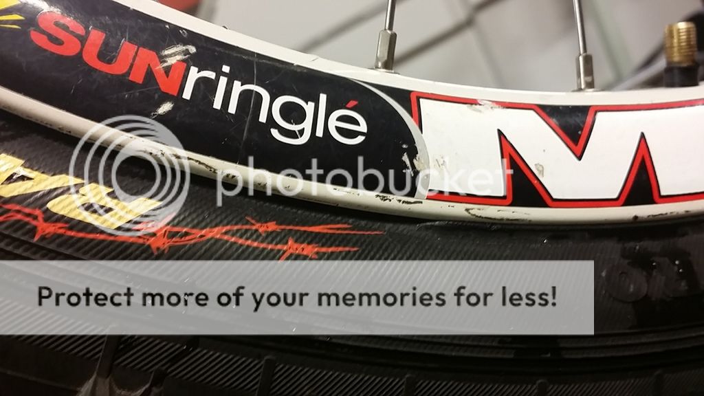 Tube mountain bike tire won't seat properly in rim. Help needed